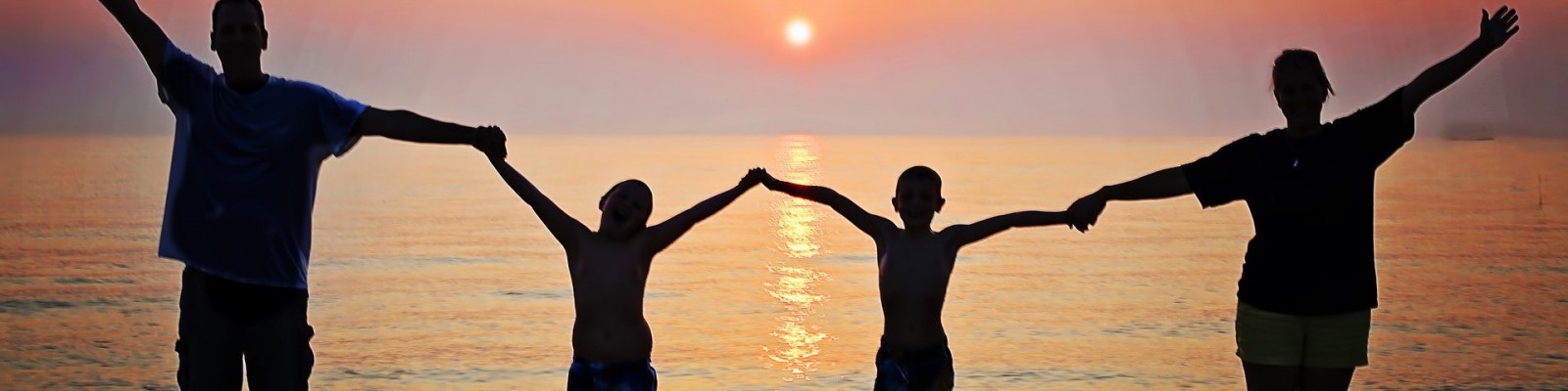 Family Silhouette Holding Hands