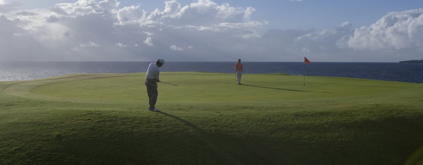 Golfers in the sun