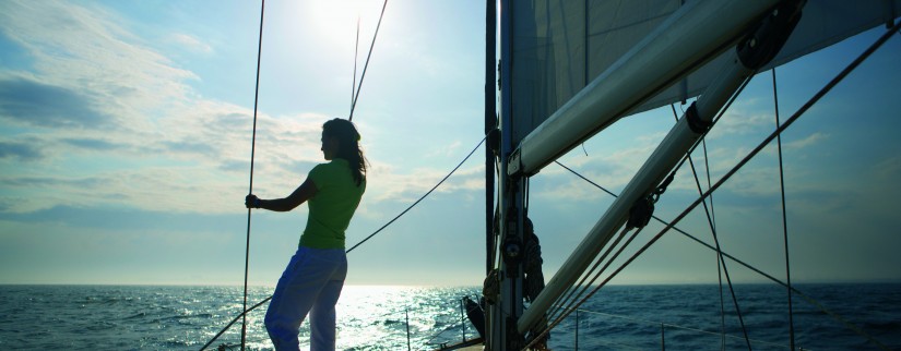 Woman sailing a boat